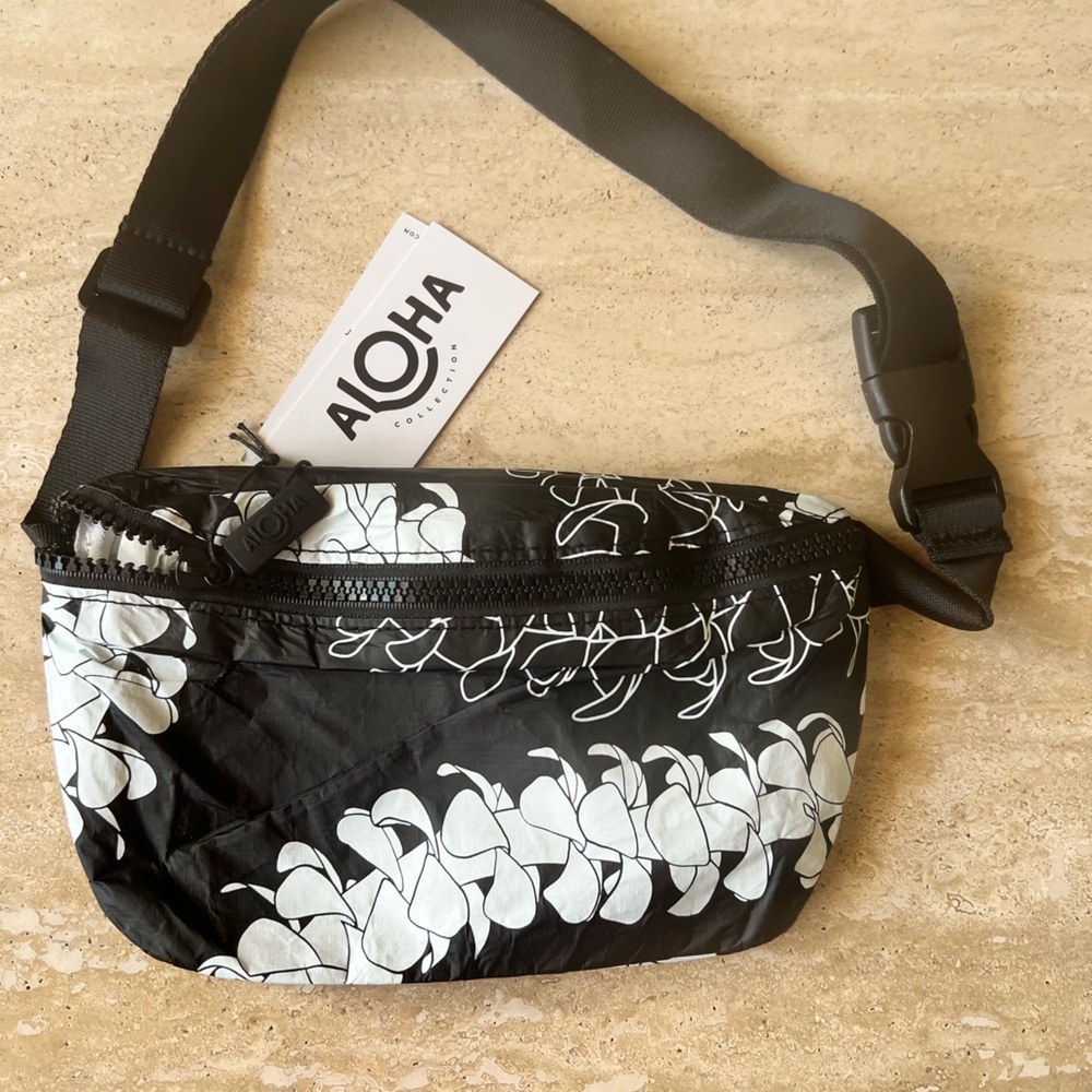 ALOHA Collection Puakenikeni Black/White Hip Pack, 8 3/4” wide, 5 1/2” high.